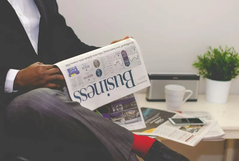 ADL Estate Planning: A financial newspaper on a desk