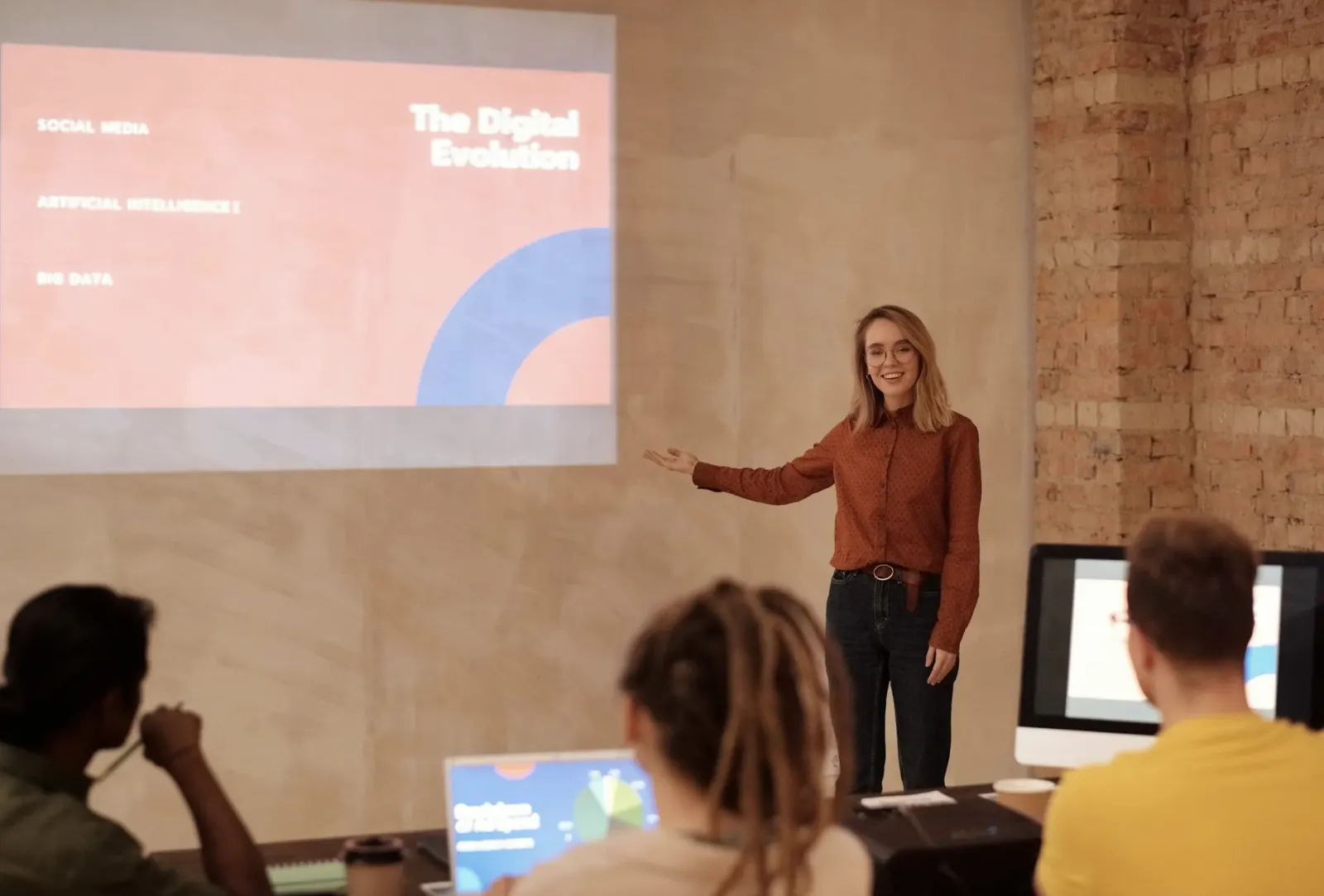 Cosensa: A trainer presenting to a room of professionals